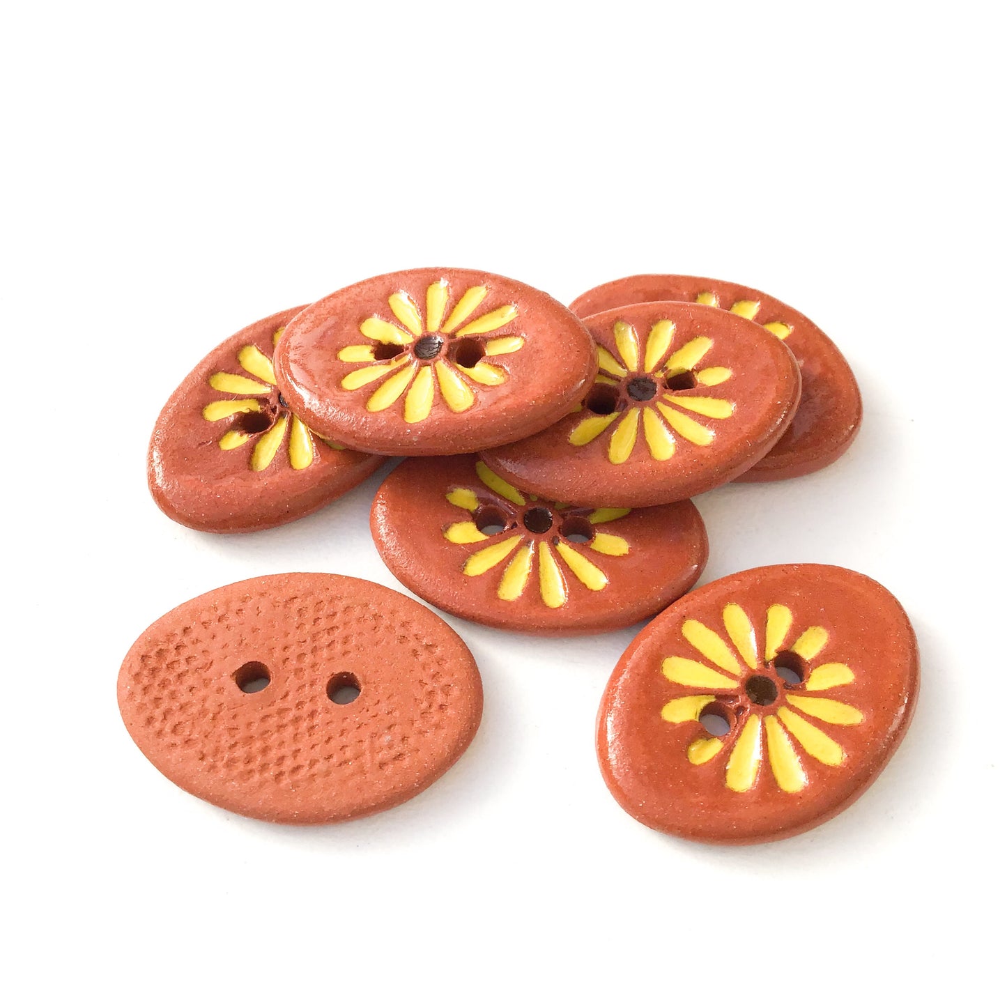 Yellow Daisy Button on Red Clay 5/8" x 7/8"