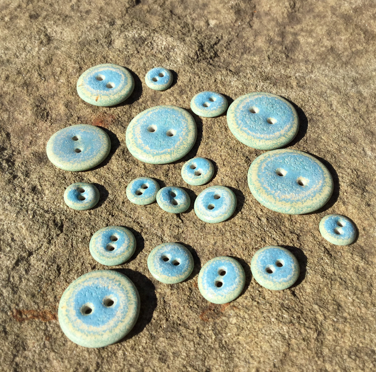 "Rip Tide" Porcelain Button - 6 sizes